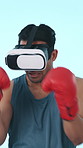 Boxing, sports and man in studio with virtual reality for training, exercise or digital workout. Fitness, practice and person with vr headset for match, game and hobby in metaverse on blue background