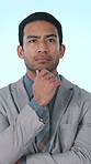 Thinking, business and man with ideas in studio background for vision, decision and finance solution. Thoughts, male person and serious expression for problem solving, financial choice and investment