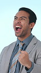 Excited, employee and man with fist pump in studio, achievement and celebration for career milestone. Blue background, happiness and person with job promotion, good news and cheering for success