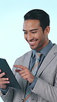 Happy, tablet and business man in studio with good news for investment, stock market and trading. Corporate, entrepreneur and person on digital tech for website, scroll and fintech on blue background