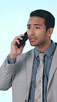 Frustrated, phone call and businessman with anger in studio, shouting and communication with contact. Blue background, entrepreneur and person with mobile for discussion, furious and disagreement