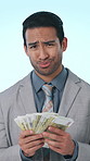 Face, businessman and counting cash in studio for wealth, financial freedom and savings. Smug, male person and dollar bills for lottery winner, investment and income increase on white background