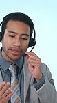 Call center, talking and angry businessman in studio for customer service, contact us and consulting. Corporate, upset and person with headset for client issue, problem and help on blue background