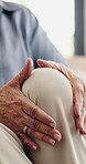 Hands, knee pain and injury in retirement home with fatigue, arthritis or muscle sprain on lounge sofa. Elderly person, joint ache and fibromyalgia for inflammation, strain or tension in house