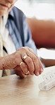 Hands, pills and container for schedule with prescription drugs, wellness and retirement home. Elderly person, sorting and pharmaceutical product with reminder, organizer and supplements in house