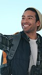 Studio, tourist and man with smile for selfie, memory and profile picture on holiday or backpacking. Travel, influencer and person on adventure, blue background and photography for social media post