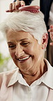 Volunteer, happy and old woman in nursing home with hairbrush, support and assistance for grooming. Carer, senior person and smile in retirement center with haircare, help or getting ready in morning