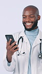 Fist pump, phone and doctor with success in studio for insurance approval, results and good news. Healthcare, excited and black man on smartphone for winning, promotion or victory on white background