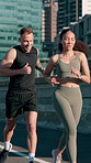 Active friends, cardio and running on bridge, fitness and training for marathon in city and together. Outdoor, athlete and people with smile on race, wellness and workout routine for sport tournament