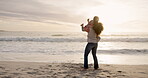 Running, hug and mother with daughter at beach for support, bonding and family holiday. Connection, love and sunset with parent and child outdoor for summer vacation, travel and weekend break