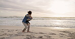 Running, hug and father with son at beach for support, bonding and family holiday. Connection, love and sunset with parent and child outdoor for summer vacation, travel and weekend break together