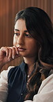Laptop, stress and thinking with business woman at desk in office for planning or research. Computer, online report and problem solving with Indian employee in corporate workplace for development
