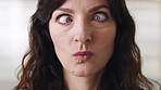 Funny face, pout and squint with silly woman in studio for comedy, goofy expression or humor. Comic, crazy and joke with playful person having fun for ,character, childish behavior or personality