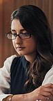 Thinking, glasses or Indian woman in office with tech, budget insight or plan for funding pitch. Reflection, specs or finance consultant with laptop, problem solving or proposal idea for investment.