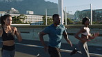 Running, training and people in city, friends and exercise for health benefits, support and challenge. Energy, men and women in street, cardio workout and fitness for wellness, endurance or speed