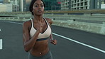 Running, training and black woman in city, wellness and fitness for health benefits, routine or practice. Challenge, runner or person in street, cardio workout or exercise for endurance or energy