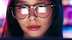 Laptop, neon and reflection in glasses with designer woman online for web development. Computer, eyewear and reading with person in office of digital design agency for artistic or creative career