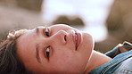 Happy, relax and face of woman outdoor on holiday, getaway or weekend trip for self care. Smile, break and portrait of female person with peace, mindfulness or calm in nature on vacation for travel.