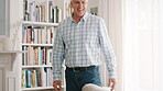 Grandfather, jumping and playful with boy on sofa in home living room for bonding or having fun. Energy, excited and senior man playing with grandson in apartment for morning, holiday or weekend
