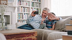 Grandfather, phone and video call with girl on sofa in home living room for bonding, laughing or visit. App, hug and wave of senior with happy granddaughter in apartment for virtual communication