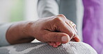 Holding hands, love and child with grandmother on couch for home, support and bonding together. Family, care and person with girl in living room for empathy, connection and security in relationship