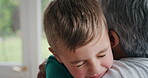 Love, grandmother or boy in house with hug, childcare or bonding in healthy relationship. Support, old woman or grandchild in home with embrace, family trust or connection for childhood development.