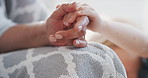 Holding hands, support and kid with grandparent on sofa for love, home and bonding together. Family, care and person with child in living room for empathy, connection and security in relationship