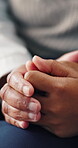 Hands, parent and kid with comfort in home for emotional support, concern and trust with confession. Family care, person or console child in house for empathy, reassurance or security in relationship