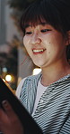 Tablet, smile and businesswoman in city at night with research for creative project online. Digital technology, reading and Asian female magazine editor with article for publishing in urban town.