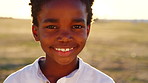 Face, outdoor and boy with smile, kid or summer holiday to relax, travel weekend or nature. Laugh, youth or black child with break, sunshine or ocean for vacation, adventure or happiness in Australia