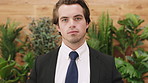 Face, corporate and business man in office for ecology, environmental law and serious worker. Suit, green consultant and portrait of confident person, legal expert and sustainability attorney