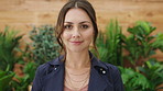 Face, woman and smile in office with creativity, marketing employment or pride for career development. Confident, female person and happy in workplace with brand management, advertising or hair tuck.