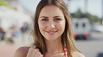 Travel, vacation and face of woman with smile on city street for summer, holiday or weekend in break. Portrait, tourist and sightseeing with happy girl, laugh and relax outdoors for trip in Miami