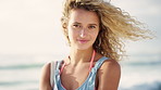 Fashion, student and face of woman on beach for vacation, holiday and travel for sightseeing. Style, nature and portrait of person by ocean for spring break, trip and relax on weekend for tourism