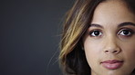 Student, face and serious woman in studio, mockup space and planning of academic growth with studies. Gray background, education and person with skill development, reflection and wonder in Brazil