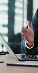 Businessman, hand and discussion in office with laptop, audit meeting and advice for finance report. Person, talk or plan in workplace with computer, collaboration or review for financial accounting.