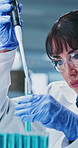 Scientist, glasses and woman with test tube in lab, biotech or medical research for drug development. Clinic, ppe and mature person with eyewear for safety, pharmaceutical and innovation with pipette