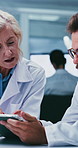 Scientist, people and tablet with discussion in lab for clinical trial, medical results and innovation. Staff, team and tech with feedback for cancer research, vaccine development and method planning