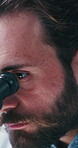 Science, study or man in lab with microscope, test or examination in vaccine development. Medical, analysis or scientist in clinic with equipment, research or inspection in pharmaceutical trial.