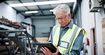 Man, engineer and reading with tablet at warehouse for research, machine update and technical guide. Mature person, digital and production manual, automation and diagnostics report for manufacturing