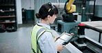 Engineering, controller and manufacturing with woman in workshop for industrial, automation and inspection. Robotics, technician and machinery with person in factory for safety and production line
