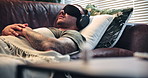 Psychedelic, appointment and man with headphones on sofa, blindfold therapy or soldier with eye mask. Mental health, counseling and person with military trauma on couch, audio and sensory deprivation