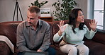 Angry, couple or shout in therapy for marriage counseling, relationship crisis or conflict in office. Psychologist, man and woman in session for fight, frustrated and scream at partner for argument
