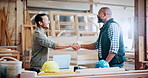 Discussion, carpenter and men with handshake in warehouse for deal, meeting or furniture production. Woodworking, people and shaking hands for timber supply, lumber and agreement for construction