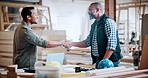 Discussion, carpenter and men with shaking hands in warehouse for deal, meeting or furniture production. Woodworking, people and handshake for timber supply, lumber and agreement for construction