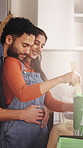 Smile, hug and couple with paint in new home, remodeling project and property ownership for maintenance. Mixing, apartment renovation and happy people with embrace for bonding, makeover and support 