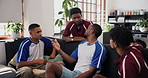 Sports, friends and talk in home with popcorn, game discussion or football fans at watch party. Men, snacks and banter at gathering for soccer rivalry, match debate or eating at half time in house