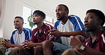 Celebrate, excited and friends watching tv on couch, rival teams or competitive fans for football game. Handshake, below or people with soccer match live stream in home, frustrated or happy for goal