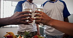 Celebration, hands and toast with sports team in home dining room together for bonding. Alcohol, cheers and event with group of people in apartment for social gathering, squad party or success