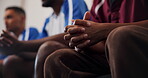 Anxious, hands and people in home for watching tv, sports match and worry for final tournament round. Friends, nervous and person with stress for soccer competition pressure, live stream or broadcast